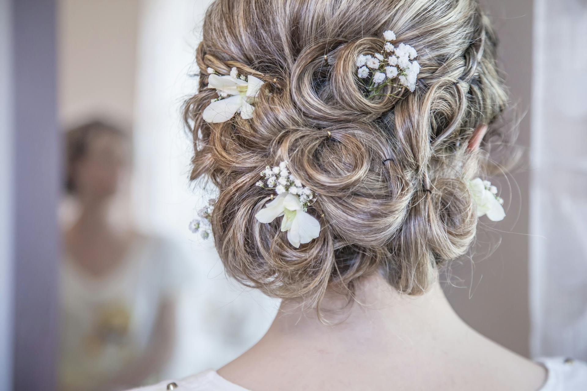 woman with wedding flowers in hair